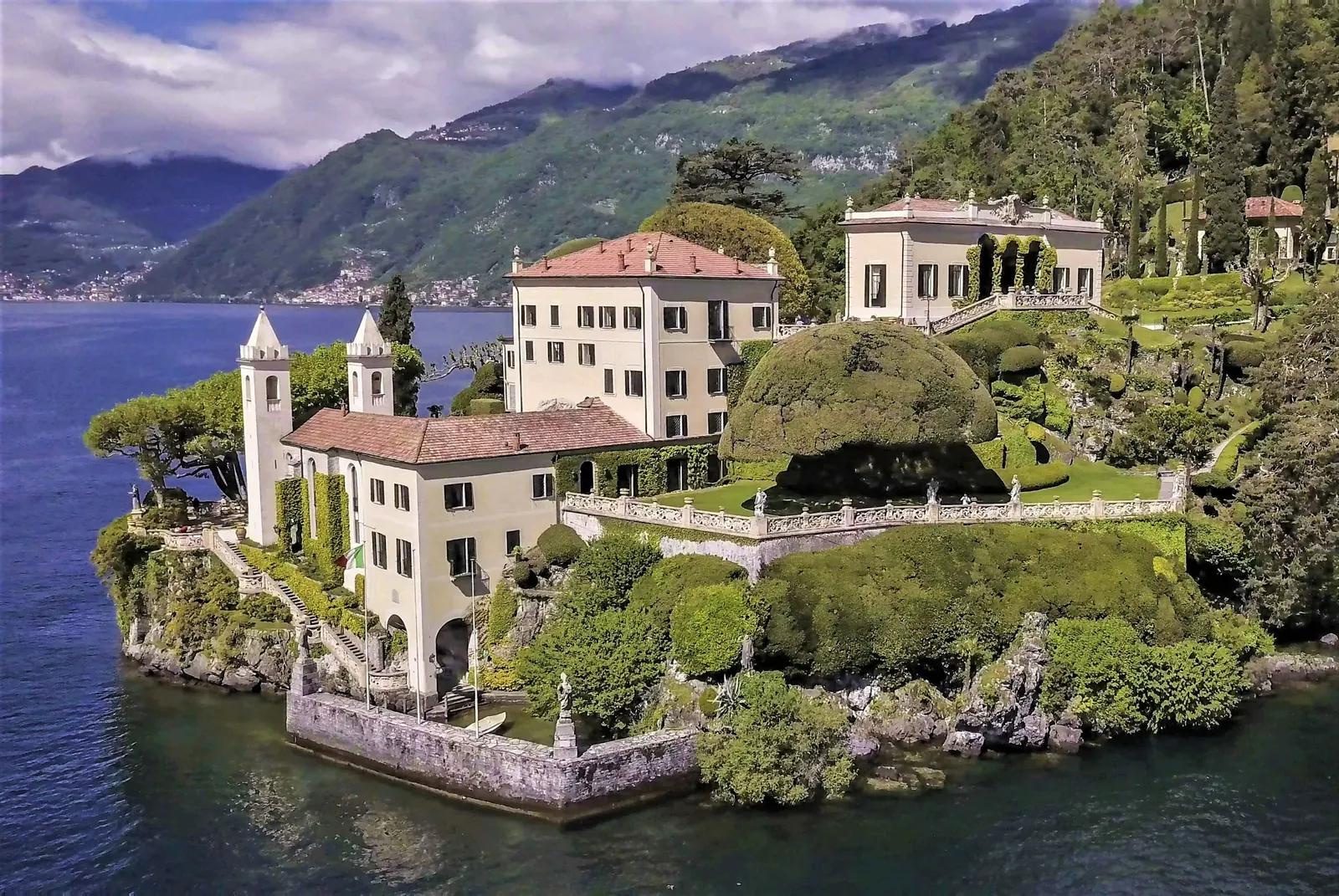 Villa del Balbianello on its wooded promontory in Lake Como